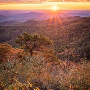 Sunrise and sunrays, over the mountains and valley