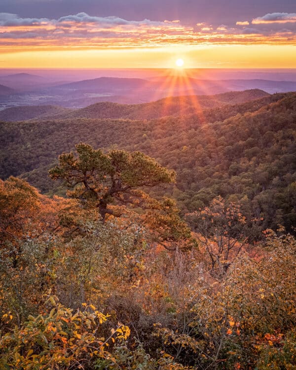 Sunrise and sunrays, over the mountains and valley